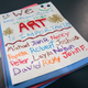 A petition decrying the cuts drafted and signed by concerned third-graders in Ida Rosen's class in Marquette, MI.